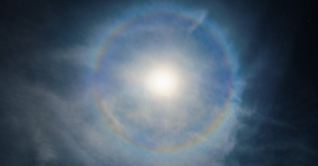 This incredible image shows a rare phenomenon of the moon surrounded by a celestial rainbow - Featured image