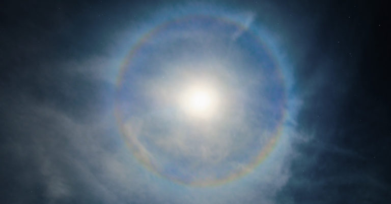 This incredible image shows a rare phenomenon of the moon surrounded by a celestial rainbow - Featured image