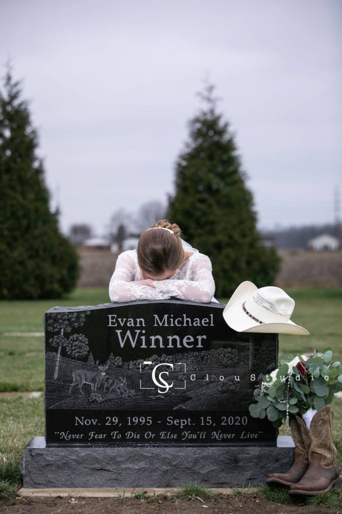 Olivia Kunkler saddened and leaning on husband's grave stone 