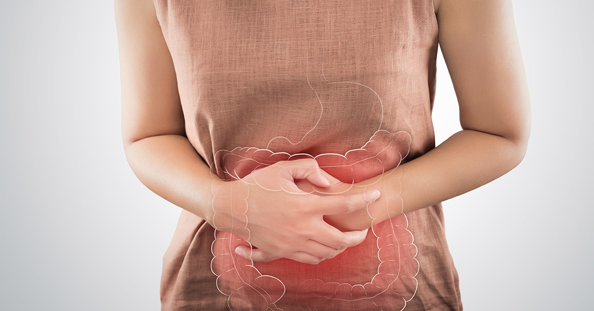 woman holding hurting stomach
