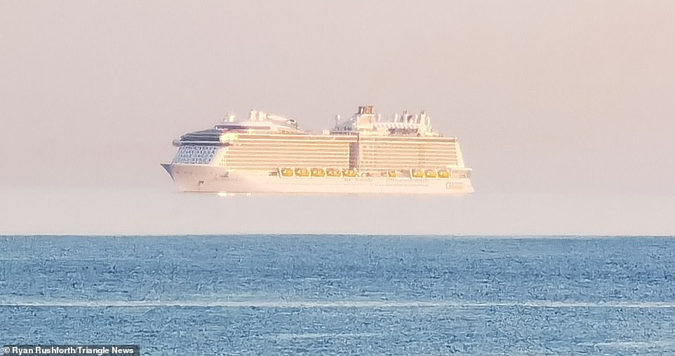 An image of a cruise ship appearing to float in mid air taken off the coast of the UK. 
