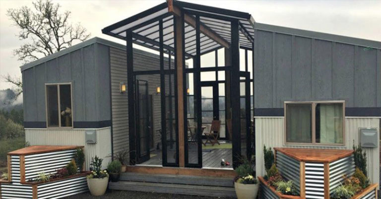 Two Tiny Houses and a Sunroom Combine To Comfortably Fit a Family of Four - Featured image