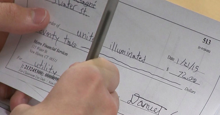 The push to teach all students how to budget money, balance a checkbook in high school - Featured image