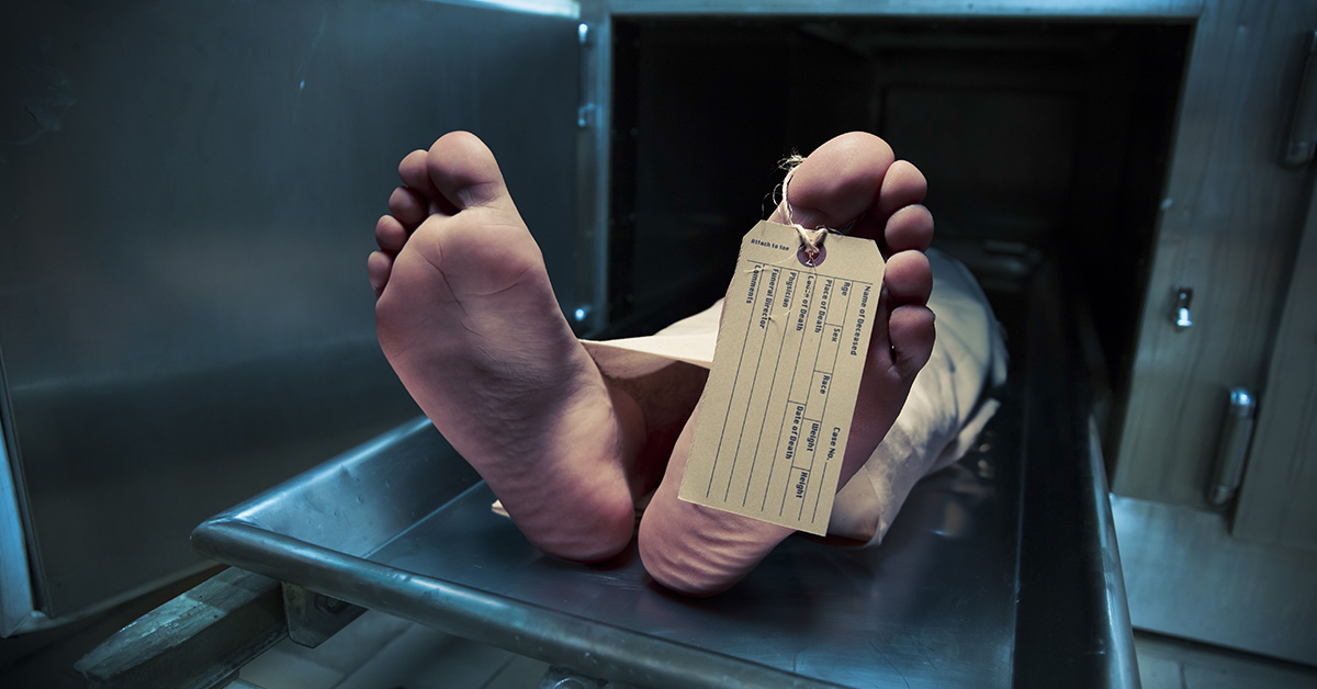 body in morgue with ID tag on toes