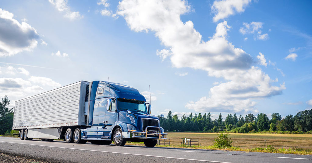 Woman Survives Car Being Flattened By Semi-Truck - Featured image