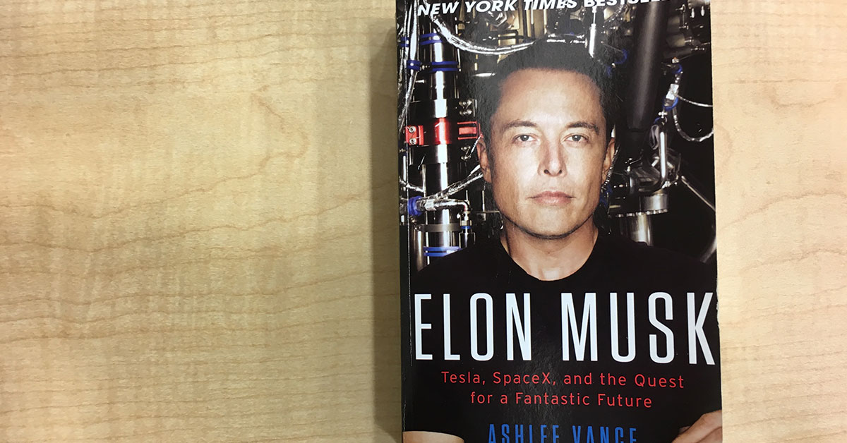 Elon Musk on the cover of a book