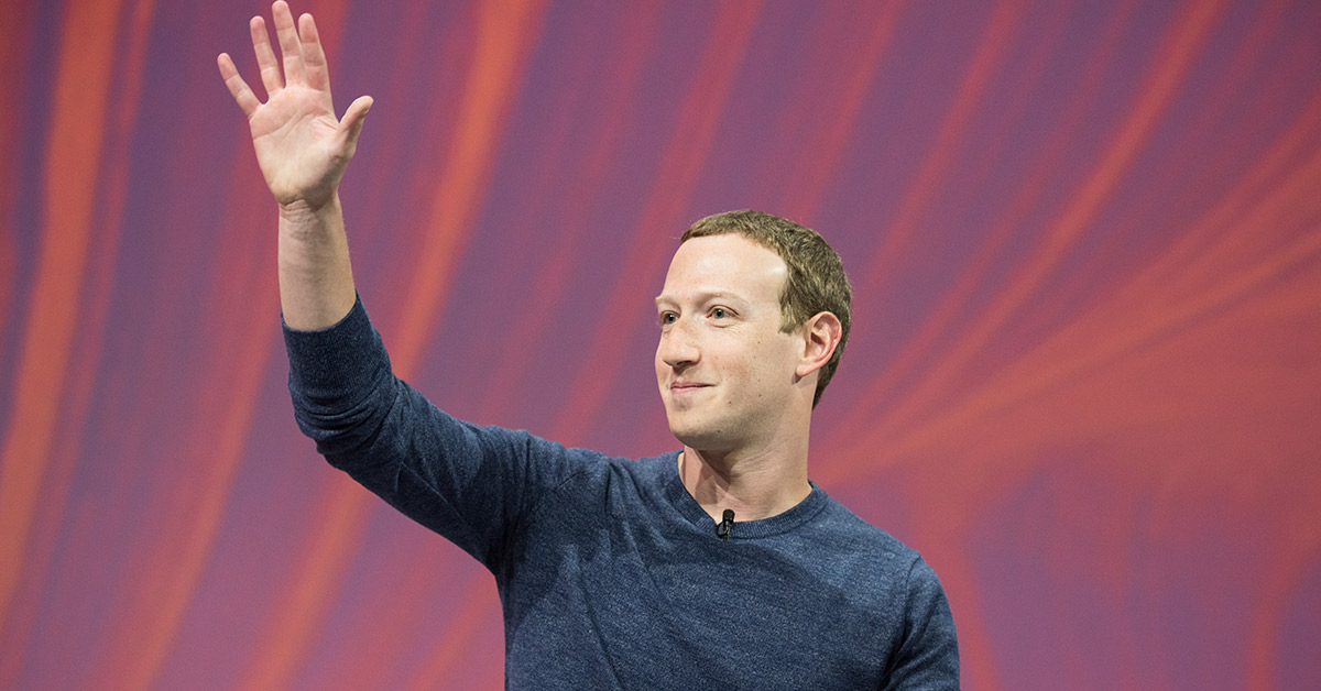 Meta and Facebook CEO Mark Zuckerberg waving