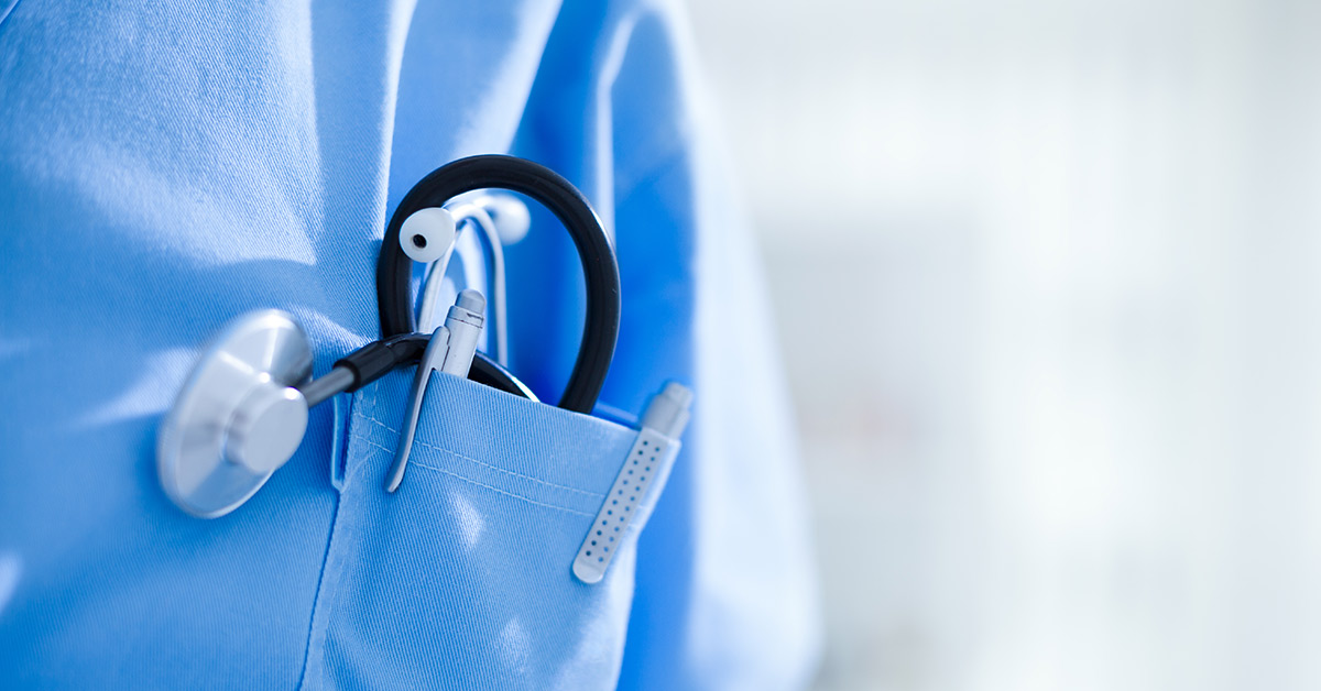 stethoscope and pen in the breast pocket of a doctor