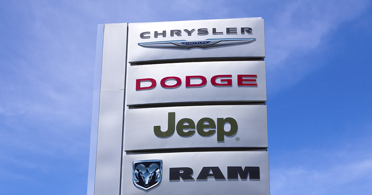 Chrysler car dealership sign which also includes Dodge Jeep and RAM