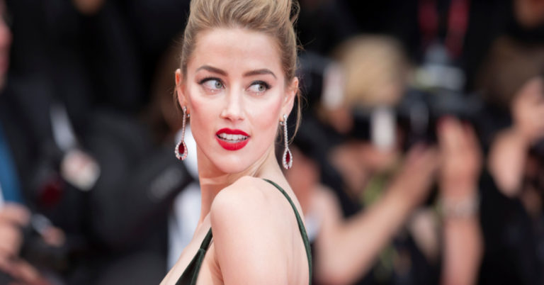 Amber Heard challenges Johnny Depp to do his own TV interview if he ‘has a problem’ - Featured image