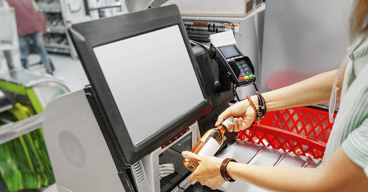 self-check out machine at grocery store