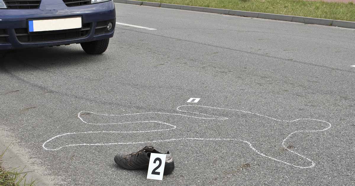 crime scene with chalk outline and a vehicle