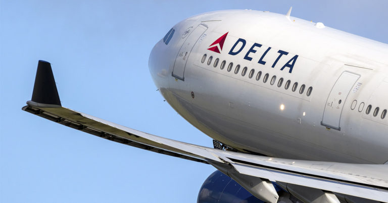 Delta Passenger Kicked Off Flight For ‘Offensive’ Sweater Now Planning To Sue The Airline - Featured image
