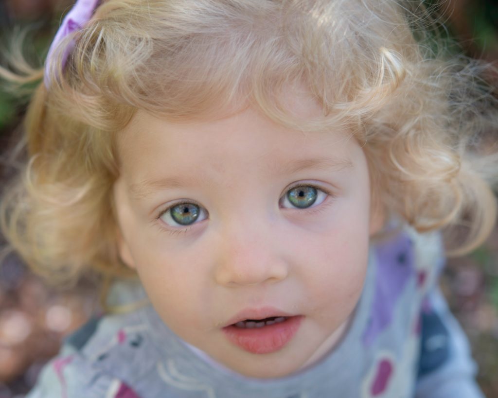 A kid with blue eyes.