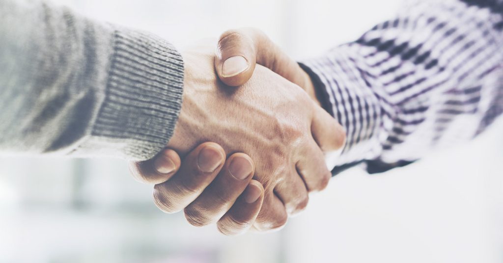 Here’s What a Handshake Symbol on a Parking Space Means - Featured image