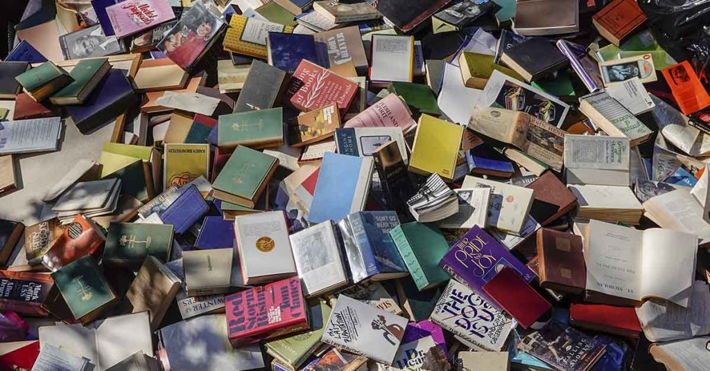Garbage Collectors Open Library with Abandoned Books - Featured image