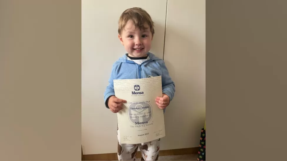 3-year-old Teddy with his Mensa membership.