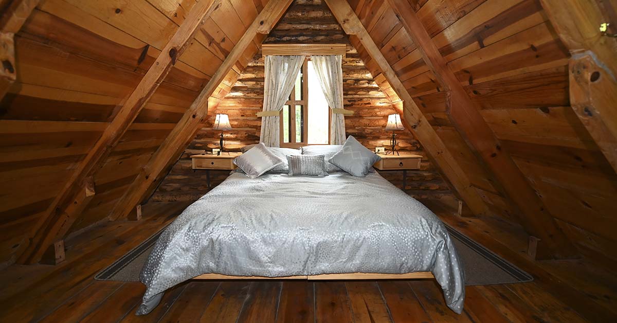 attic in luxy tiny home with a twin bed