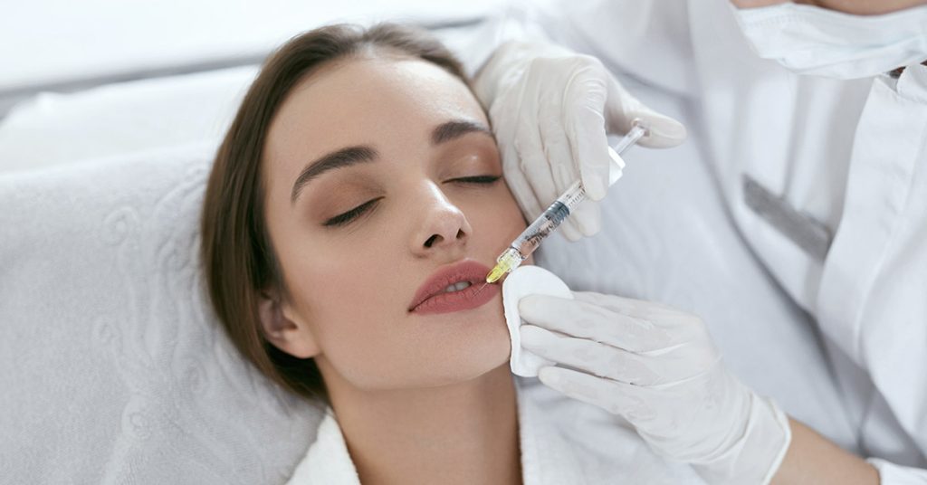 Woman with ‘world’s biggest lips’ is now splashing out on her cheekbones - Featured image