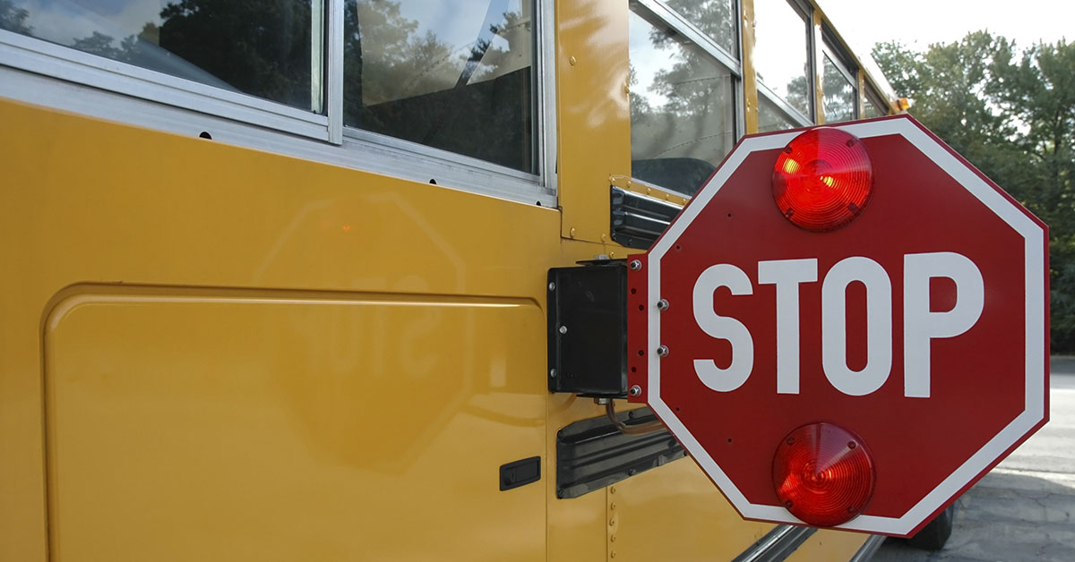 school bus with stop sign