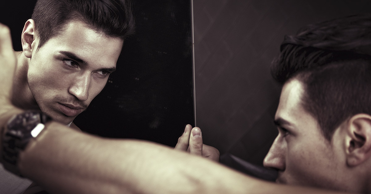 Narcissist looking in mirror