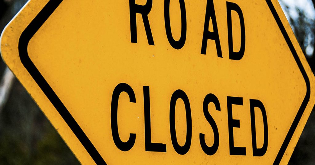 Officials search for mystery motorist who filled large pothole with concrete - Featured image