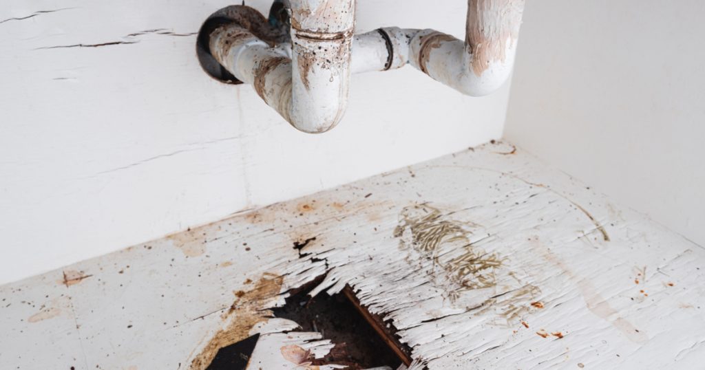 damage to wood flooring and cabinets from water leaks