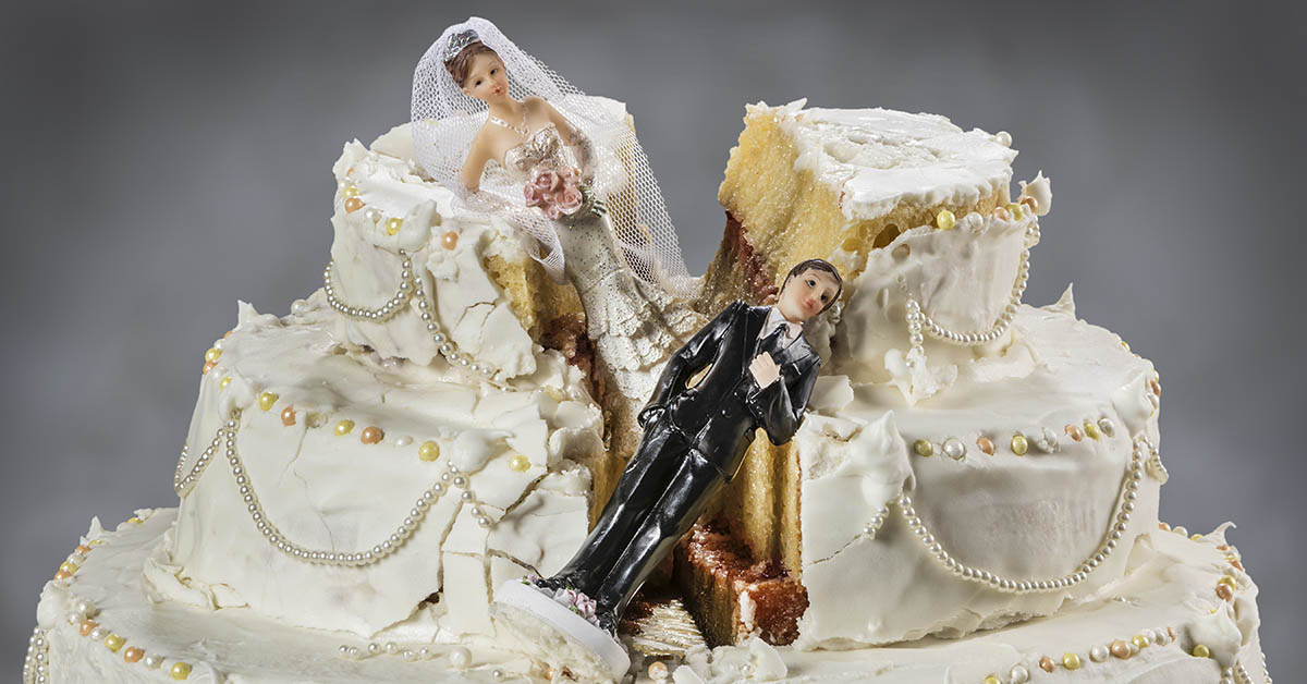 bride and groom cake decorations in a smashed wedding cake