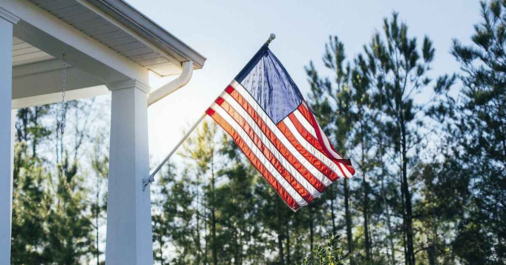 New community to require “Patriots” to fly US flags on all homes - Featured image
