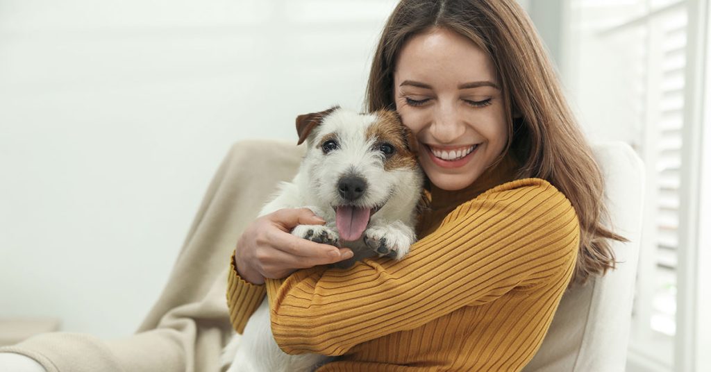 Hugging Your Dog May Do More Harm Than Good, According to Vet - Featured image