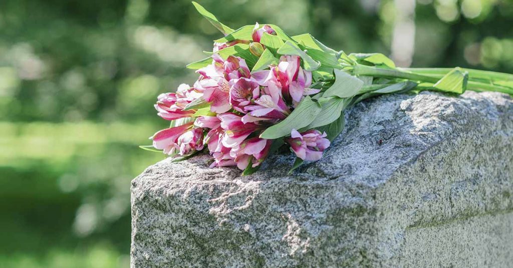 Man visits grave of wife after being released from prison for mercy killing her - Featured image