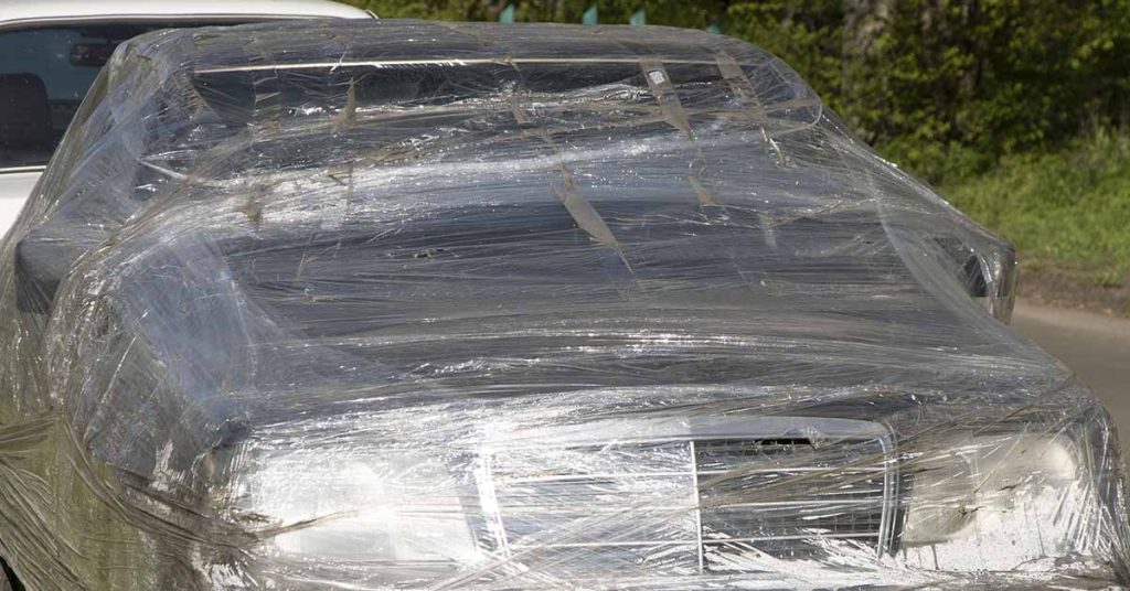 Man wraps car in cellophane after woman blocks driveway - Featured image