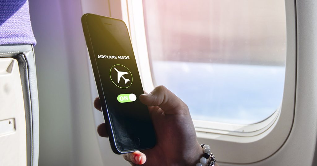 Why Passengers are Actually Told to Put Their Phones on Air Plane Mode - Featured image