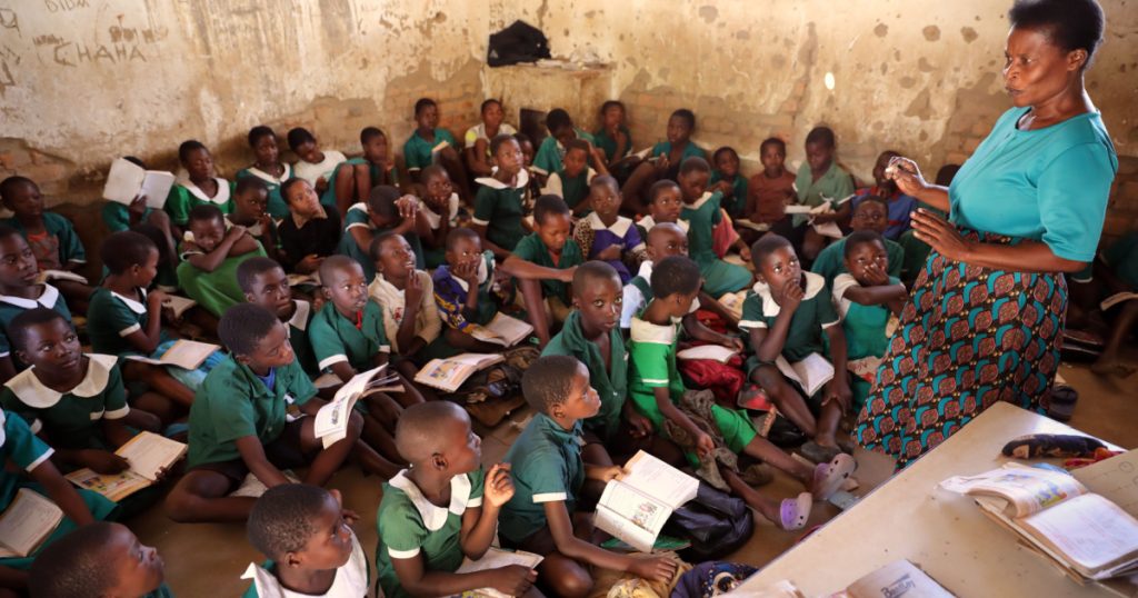 NKHOTAKOTA, MALAWI - JUNE 14, 2018: Unidentified students in a classroom of a primary school in Nkhotakota. Malawi is one of the poorest countries in the world.
