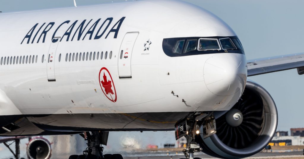 Air Canada Boeing 777-3 lining up for takeoff at Toronto Pearson Intl. Airport.
