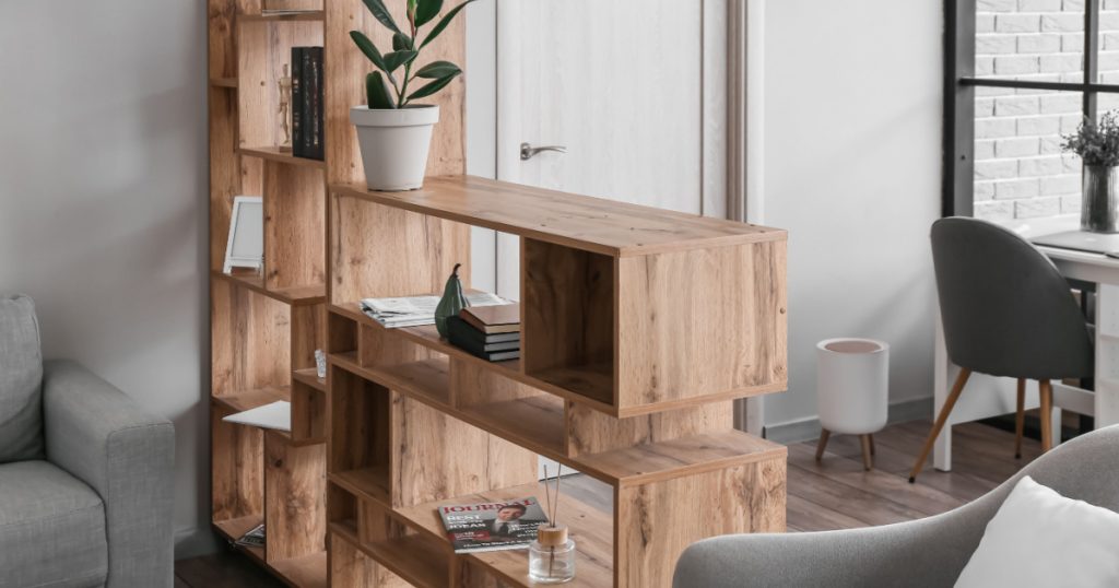 Wooden bookcase in interior of modern living room
