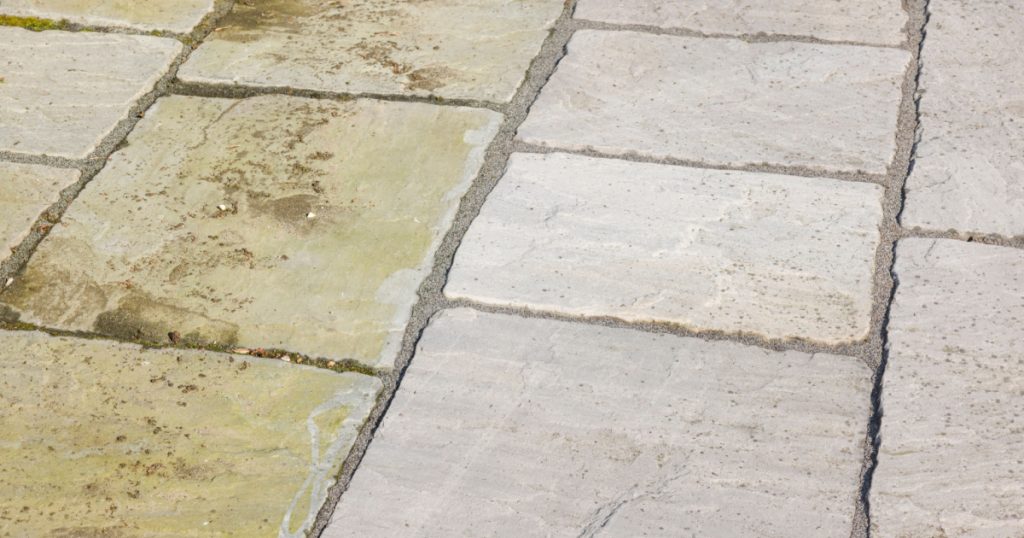Cleaning sandstone paving. Garden patio before and after jet washing or pressure washing, UK.
