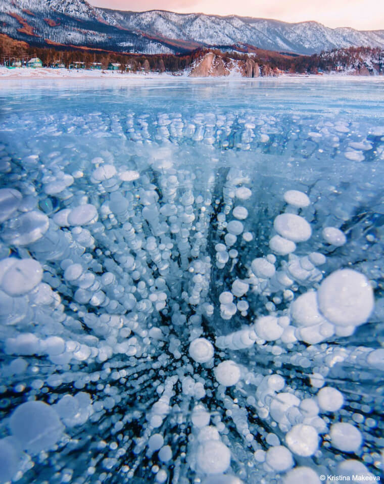 Methane bubbles trapped in ice in Canada.