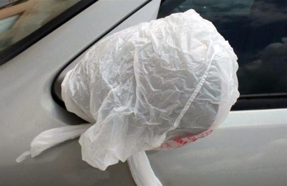 Winter hacks like placing a Plastic bag on the car side mirror