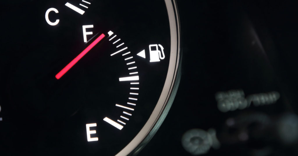 Fuel gauge showing full car fuel
