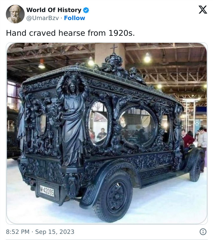 historical images  - An intricately carved hearse from the 1920's