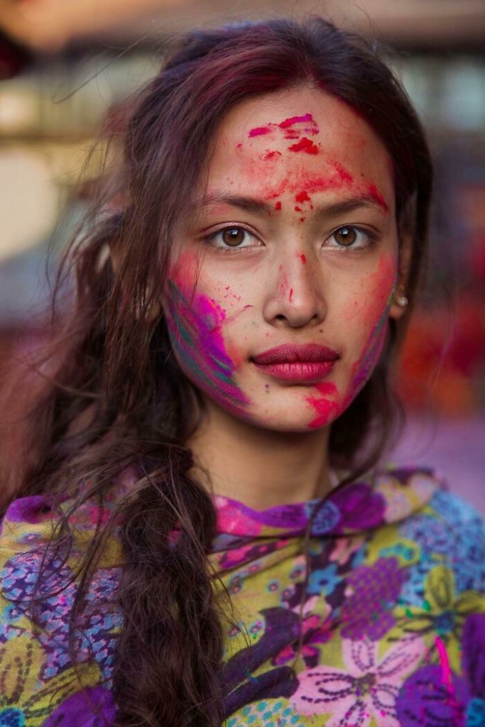 A Nepali girl celebrates the colorful and joyous festival of Holi