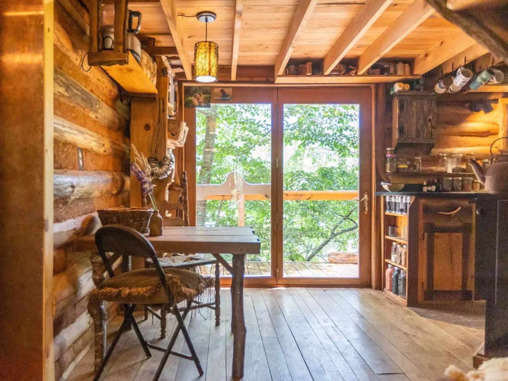 The simple dining area consists of a table and two chairs
