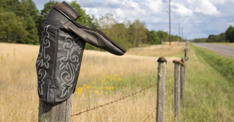 What’s the Meaning of a Boot on a Fence Post? - Featured image