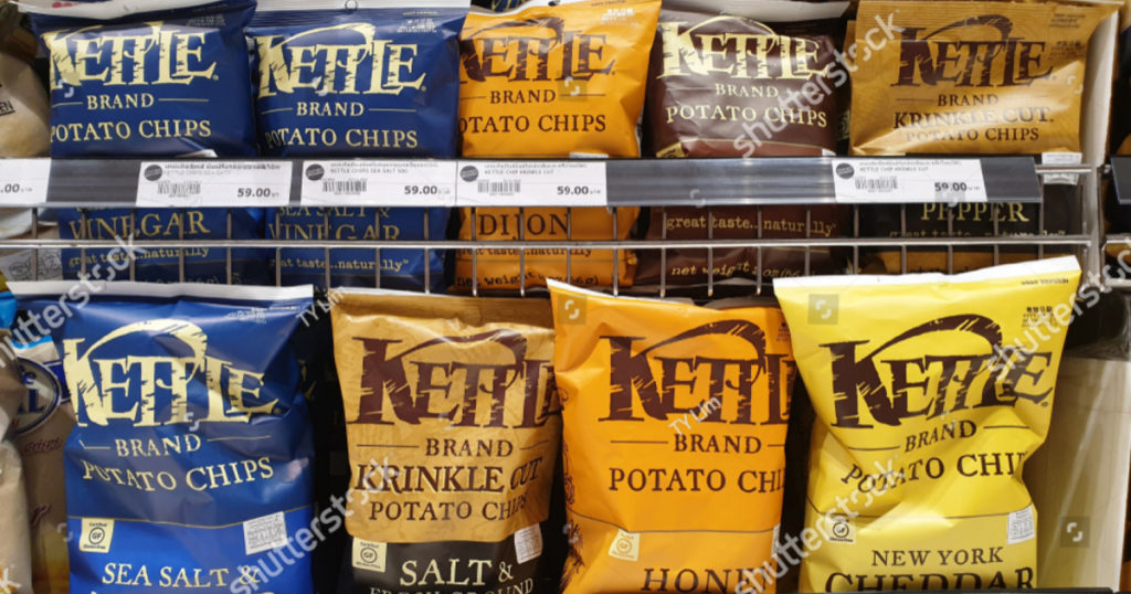 BANGKOK, THAILAND - APR 7, 2019: Kettle brand of flavoured chips and snacks on store shelf in Siam Paragon Mall. Kettle Foods is an international manufacturer of potato chips.
