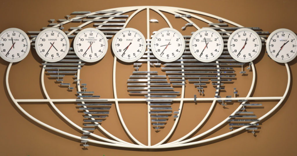 Time zone clocks showing different times

