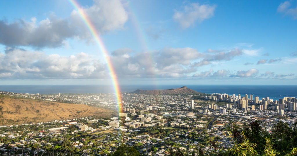 rainbow over honolulu hawaii after rain

