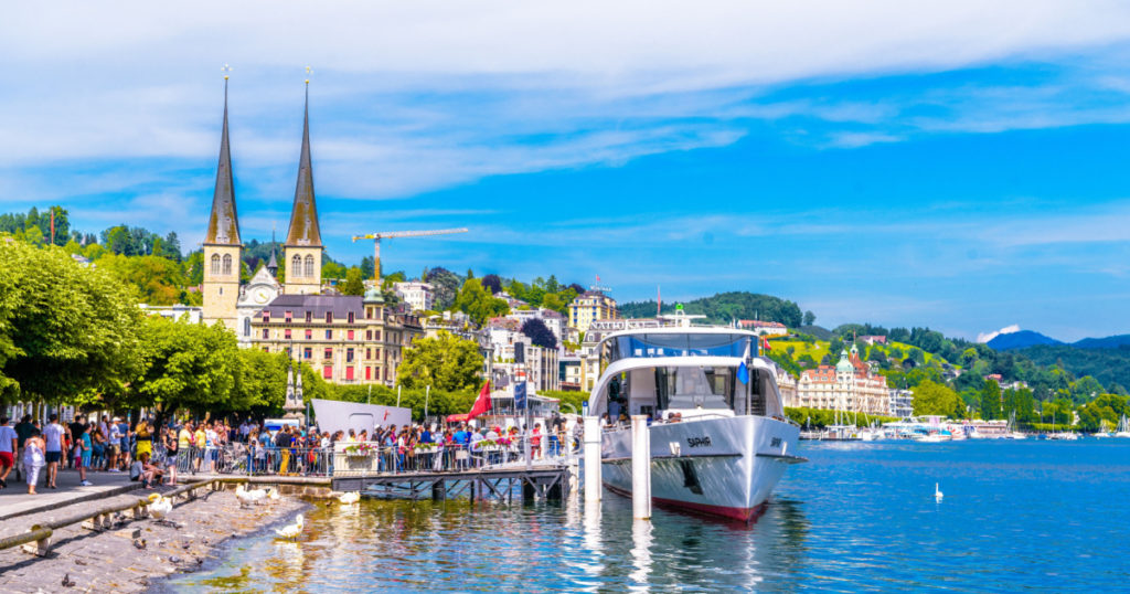 SWITZERLAND, LUCERNE - MAI 2017: Ship near the pier in the Lake Lucerne near city Lucerne, Luzern Switzerland.
