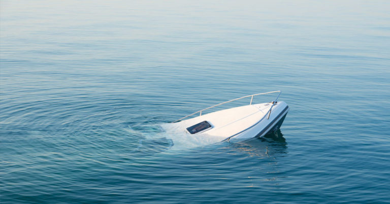 Divers find man alive in boat at bottom of the ocean 3 days after it capsized - Featured image