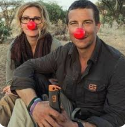 Man and woman wearing clown noses